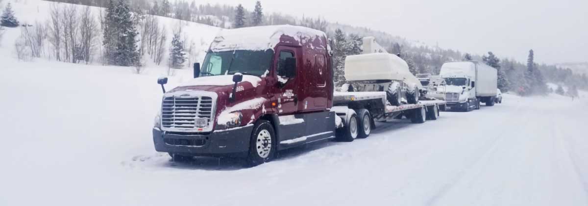 truck driving on winter roads