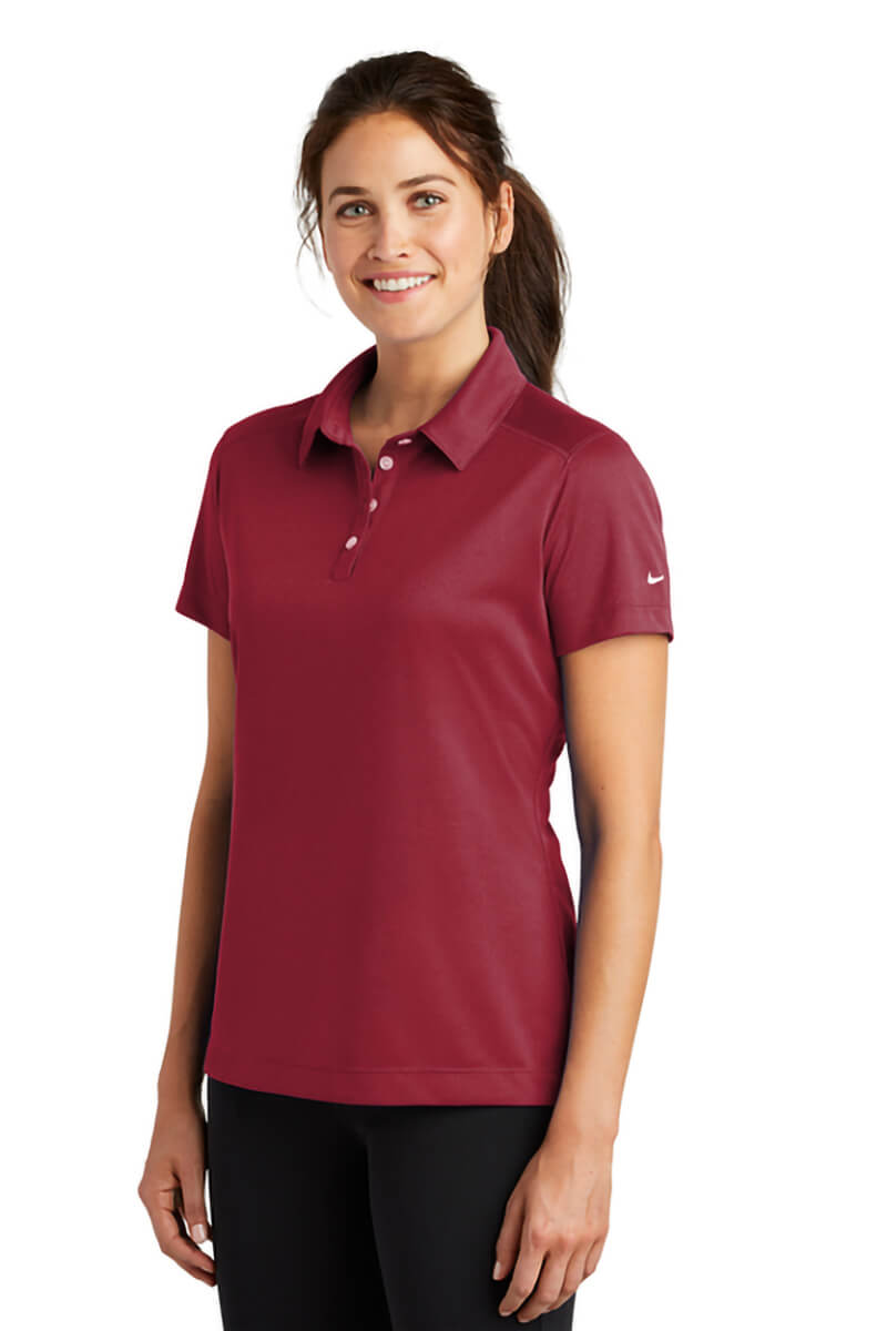 Women's Nike Dri-Fit Pebble Texture polo - Varsity Red - model front-quarter view