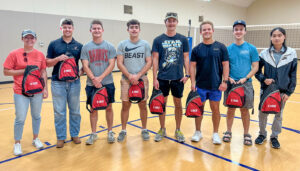 A group of 2023 summer interns took part in a summer cookout event and received some Crete Carrier branded swag bags