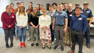 The 2024 class of interns, along with their Crete employee trainers, pose for a group photo