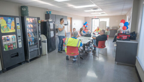 Management and drivers mingle during Driver Appreciation Month activities in the driver breakroom in Columbus, Ohio